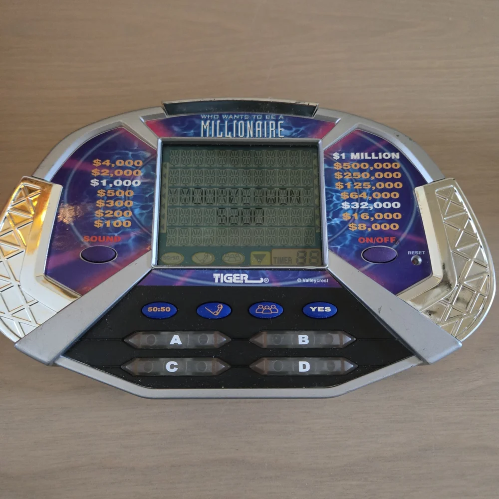 Vtg Who Wants To Be A Millionaire Handheld Electronic LCD Tiger Game Tested Work